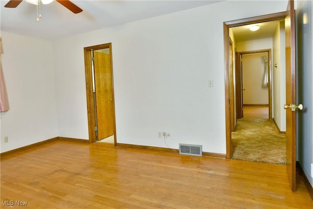 3763 E River Rd, Newton Falls, OH 44444 - unfurnished room with ceiling fan, light wood-style floors, and baseboards