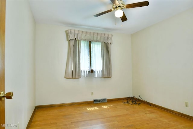 3763 E River Rd, Newton Falls, OH 44444 - unfurnished room with light wood-style floors, baseboards, and ceiling fan
