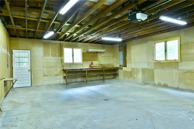 3763 E River Rd, Newton Falls, OH 44444 - garage with a garage door opener and electric panel