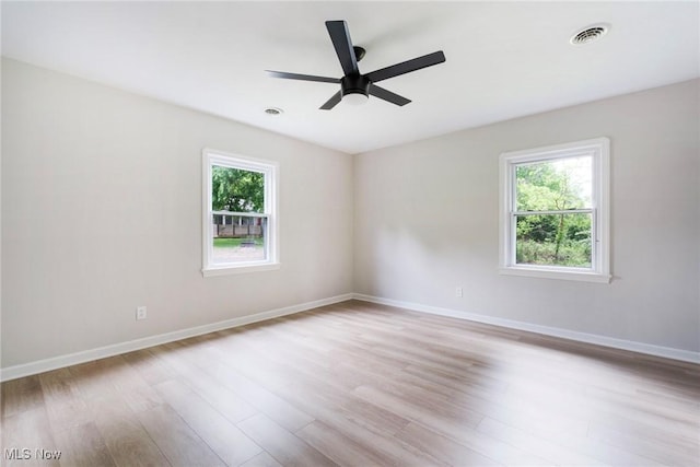 351 Cranberry Run, Boardman, OH 44512 - empty room with wood finished floors, ceiling fan, and baseboards