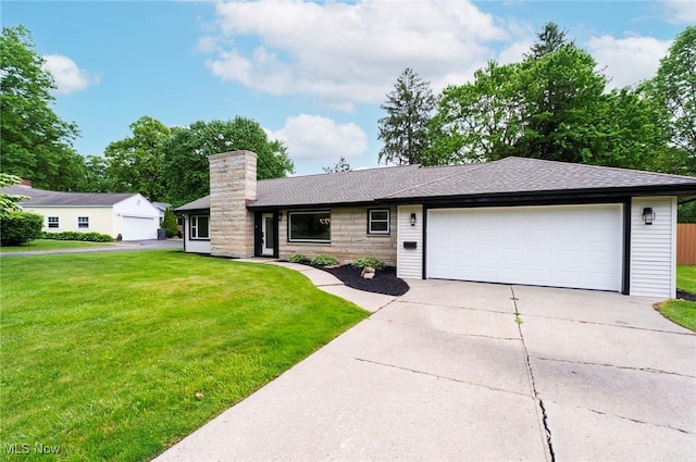 351 Cranberry Run, Boardman, OH 44512 - ranch-style house featuring a chimney, a front lawn, a garage, concrete driveway, and roof with shingles