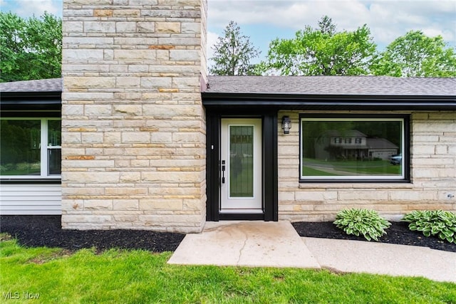 351 Cranberry Run, Boardman, OH 44512 - view of exterior entry with roof with shingles and a chimney