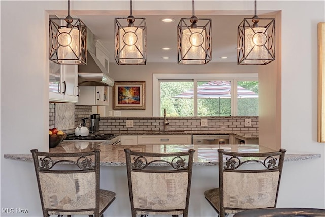 30699 Gates Mills Blvd, Pepper Pike, OH 44124 - kitchen featuring a sink, stainless steel dishwasher, stone countertops, white cabinets, and recessed lighting
