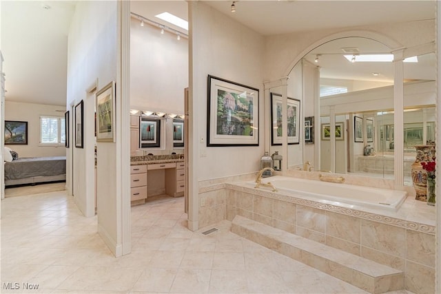30699 Gates Mills Blvd, Pepper Pike, OH 44124 - full bathroom featuring ensuite bath, a bath, vanity, rail lighting, and tile patterned floors