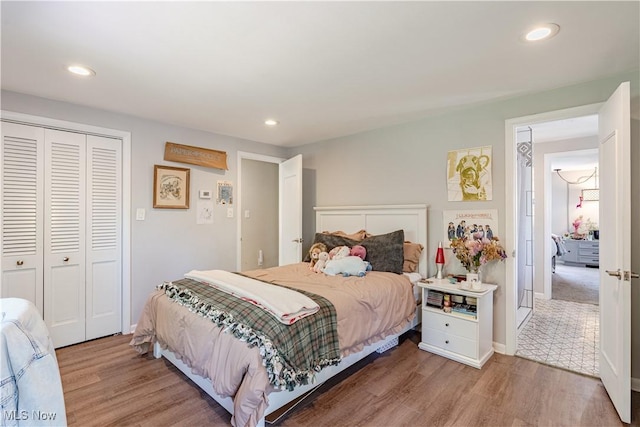 30699 Gates Mills Blvd, Pepper Pike, OH 44124 - bedroom featuring wood finished floors, recessed lighting, and a closet