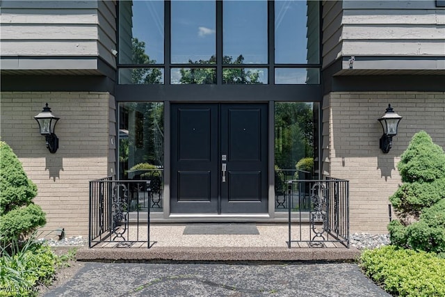 30699 Gates Mills Blvd, Pepper Pike, OH 44124 - view of exterior entry with brick siding and french doors
