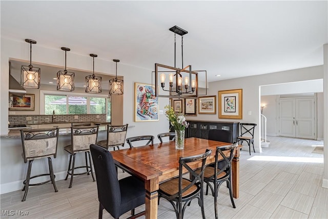 30699 Gates Mills Blvd, Pepper Pike, OH 44124 - dining room featuring a chandelier and baseboards