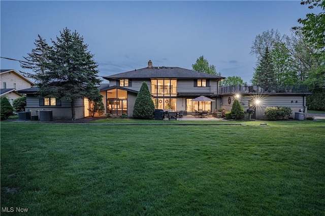 30699 Gates Mills Blvd, Pepper Pike, OH 44124 - back of house with a lawn, a patio, and central AC unit