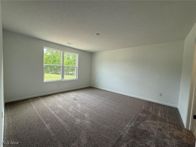 23669 Wallys Way, Columbia Station, OH 44028 - unfurnished room featuring carpet floors, baseboards, and a textured ceiling