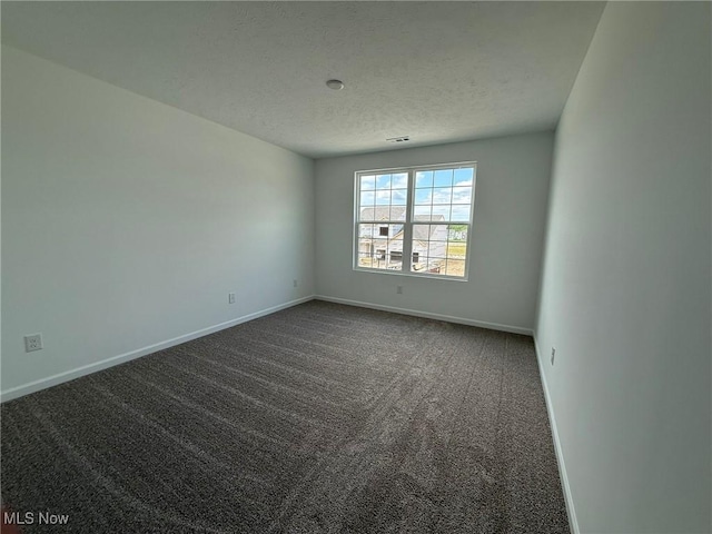 23669 Wallys Way, Columbia Station, OH 44028 - unfurnished room featuring carpet flooring, baseboards, and a textured ceiling