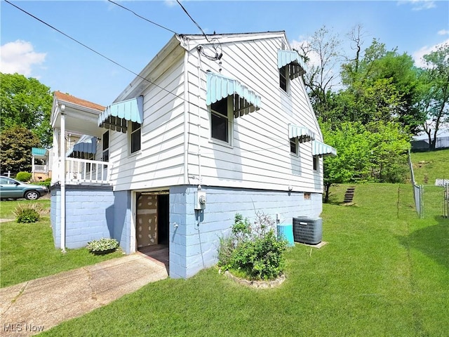 121 Valley Way, Weirton, WV 26062 - view of side of property with a yard, a garage, driveway, and central AC