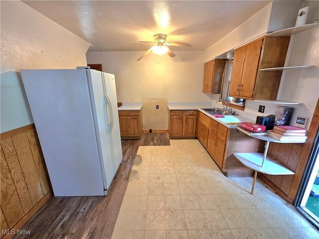 121 Valley Way, Weirton, WV 26062 - kitchen with white refrigerator with ice dispenser, open shelves, brown cabinetry, light countertops, and light flooring