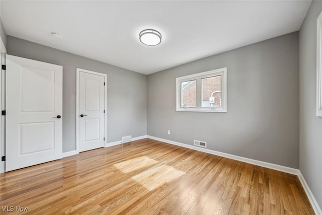 19855 Parklane Dr, Rocky River, OH 44116 - unfurnished bedroom featuring baseboards and light wood-type flooring