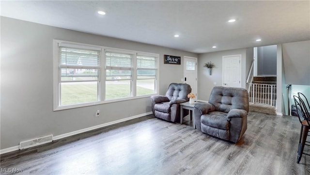 1379 S Polen Ave, Mogadore, OH 44260 - living area with wood finished floors, recessed lighting, and baseboards