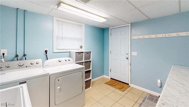 1379 S Polen Ave, Mogadore, OH 44260 - laundry room with independent washer and dryer, light tile patterned floors, and baseboards