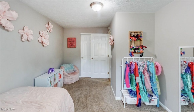 1379 S Polen Ave, Mogadore, OH 44260 - bedroom featuring carpet floors, a closet, and baseboards