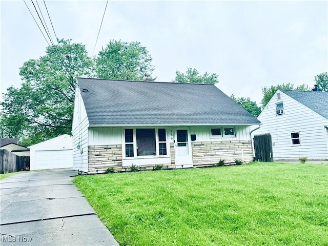 156 N Beverly, Austintown, OH 44515 - view of front of property with stone siding, a shingled roof, and a detached garage
