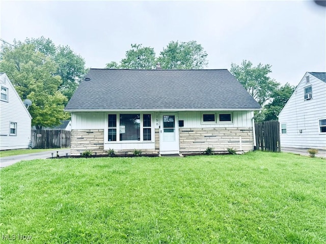 156 N Beverly, Austintown, OH 44515 - view of front of property featuring stone siding, board and batten siding, and a shingled roof