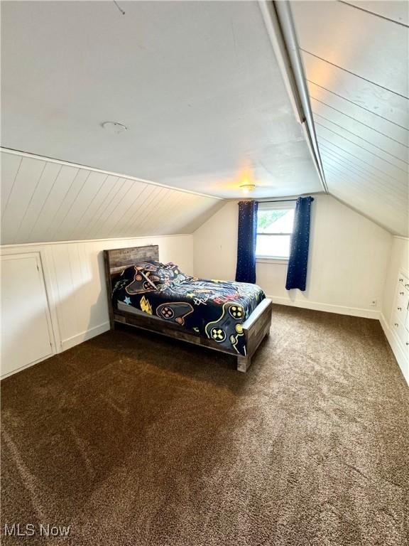 156 N Beverly, Austintown, OH 44515 - bedroom with dark colored carpet, lofted ceiling, and baseboards
