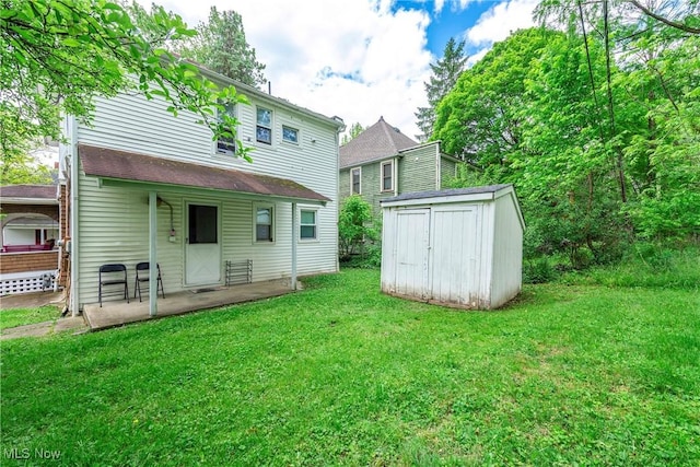 44 W Vine St, Oberlin, OH 44074 - back of property featuring a lawn and a patio