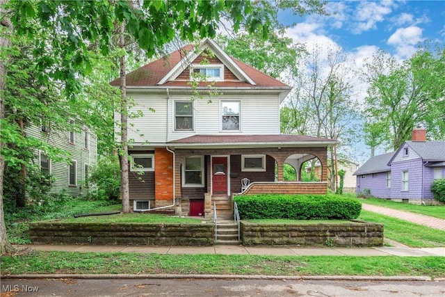 44 W Vine St, Oberlin, OH 44074 - victorian house featuring a porch