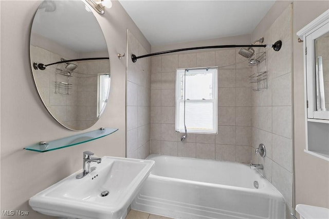 5688 Shawnee Dr, Lyndhurst, OH 44124 - bathroom with a sink, washtub / shower combination, and toilet