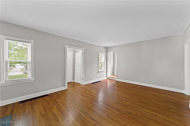 5688 Shawnee Dr, Lyndhurst, OH 44124 - spare room with hardwood / wood-style floors, baseboards, and arched walkways