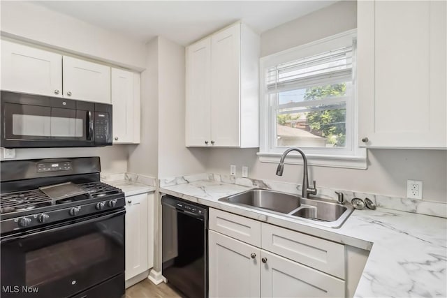 13641 Cedar Rd, University Heights, OH 44118 - kitchen featuring black appliances, a sink, and white cabinetry