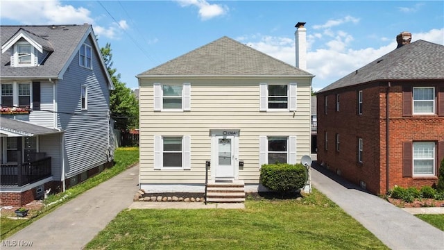 13641 Cedar Rd, University Heights, OH 44118 - view of front of property featuring a front yard and a chimney
