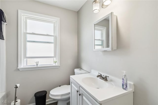 13641 Cedar Rd, University Heights, OH 44118 - bathroom featuring toilet and vanity