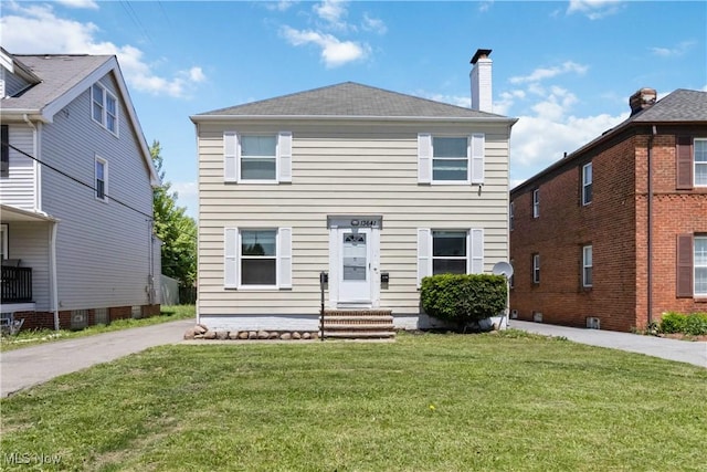 13641 Cedar Rd, University Heights, OH 44118 - view of front of home featuring a front lawn, a chimney, and a shingled roof