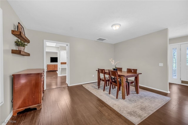 17404 Falling Water Rd, Strongsville, OH 44136 - dining space with dark wood-style floors and baseboards