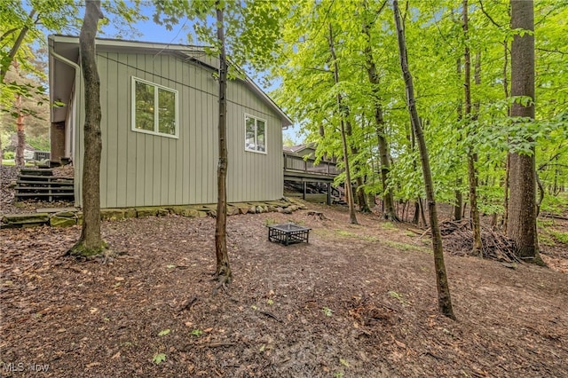17404 Falling Water Rd, Strongsville, OH 44136 - view of property exterior featuring a deck and an outdoor fire pit