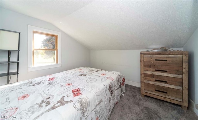 410 E Main St, Lakeside-Marblehead, OH 43440 - bedroom featuring lofted ceiling, carpet, and baseboards