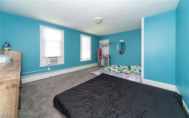 410 E Main St, Lakeside-Marblehead, OH 43440 - carpeted bedroom featuring a textured ceiling, baseboards, cooling unit, and a baseboard radiator