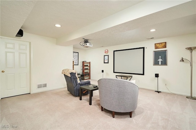 1917 Northgate Cir, Akron, OH 44320 - home theater room with light colored carpet, baseboards, recessed lighting, and a textured ceiling