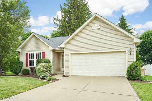 1917 Northgate Cir, Akron, OH 44320 - ranch-style home featuring driveway, a garage, and a front yard