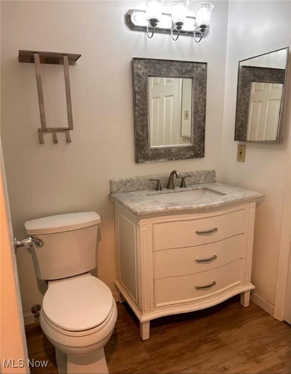 1808 Stoney Run Cir, Broadview Heights, OH 44147 - half bath with wood finished floors, vanity, toilet, and baseboards