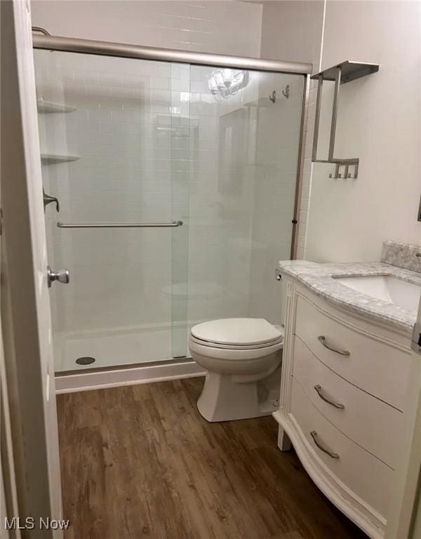 1808 Stoney Run Cir, Broadview Heights, OH 44147 - full bath featuring wood finished floors, vanity, a shower stall, and toilet
