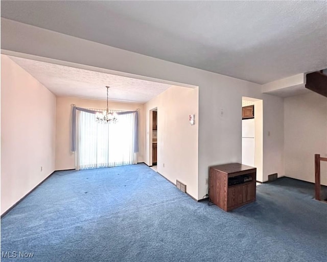 547 Towns Ln Unit 129, Richmond Heights, OH 44143 - empty room with a chandelier and carpet flooring