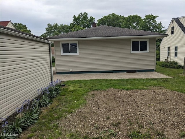 871 Chinook Ave, Akron, OH 44305 - view of home's exterior featuring a patio area and a lawn