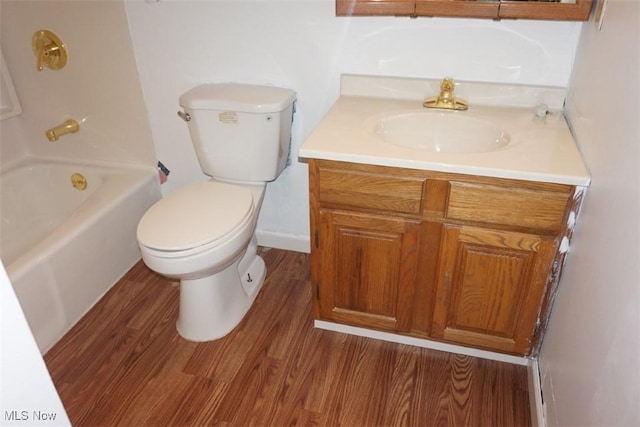 1259 Cherry Ln, Brunswick, OH 44212 - bathroom featuring wood finished floors, vanity, and toilet