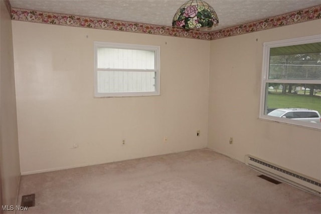 1259 Cherry Ln, Brunswick, OH 44212 - carpeted spare room with healthy amount of natural light and a textured ceiling