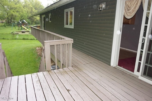 1259 Cherry Ln, Brunswick, OH 44212 - deck featuring a lawn and a playground