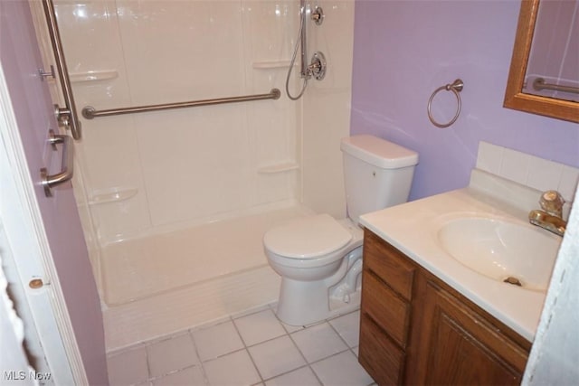 1259 Cherry Ln, Brunswick, OH 44212 - bathroom with vanity, a shower, toilet, and tile patterned floors