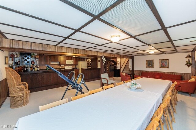 5761 Goodman Cir, North Royalton, OH 44133 - dining area with stairway, wooden walls, and wainscoting