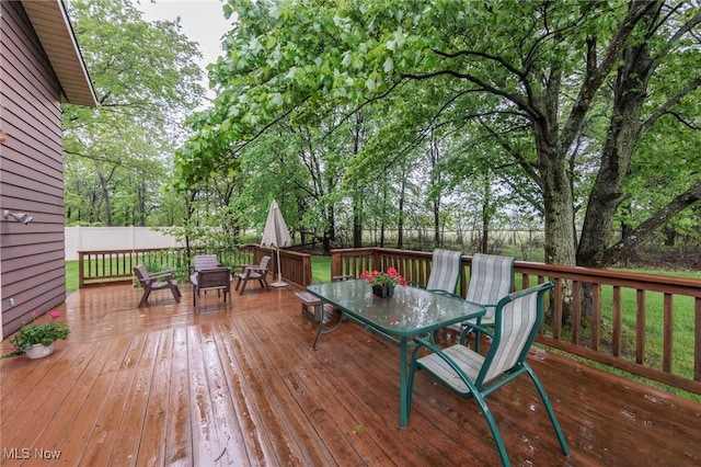 5761 Goodman Cir, North Royalton, OH 44133 - wooden deck with outdoor dining area and a fenced backyard