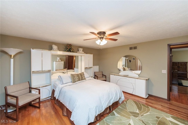 5761 Goodman Cir, North Royalton, OH 44133 - bedroom featuring light wood finished floors and ceiling fan
