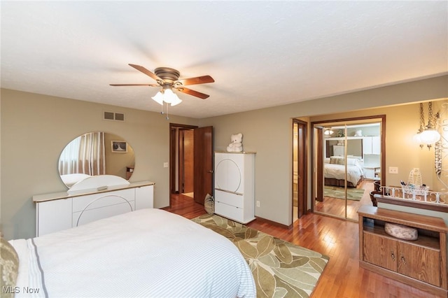 5761 Goodman Cir, North Royalton, OH 44133 - bedroom featuring wood-type flooring and a ceiling fan
