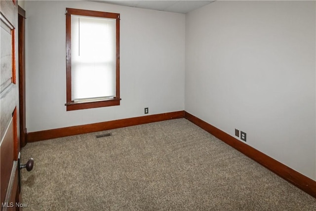 1515 E 3rd St, Port Clinton, OH 43452 - carpeted empty room with plenty of natural light and baseboards